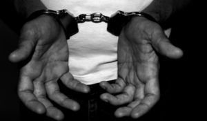 Handcuffs on a criminal