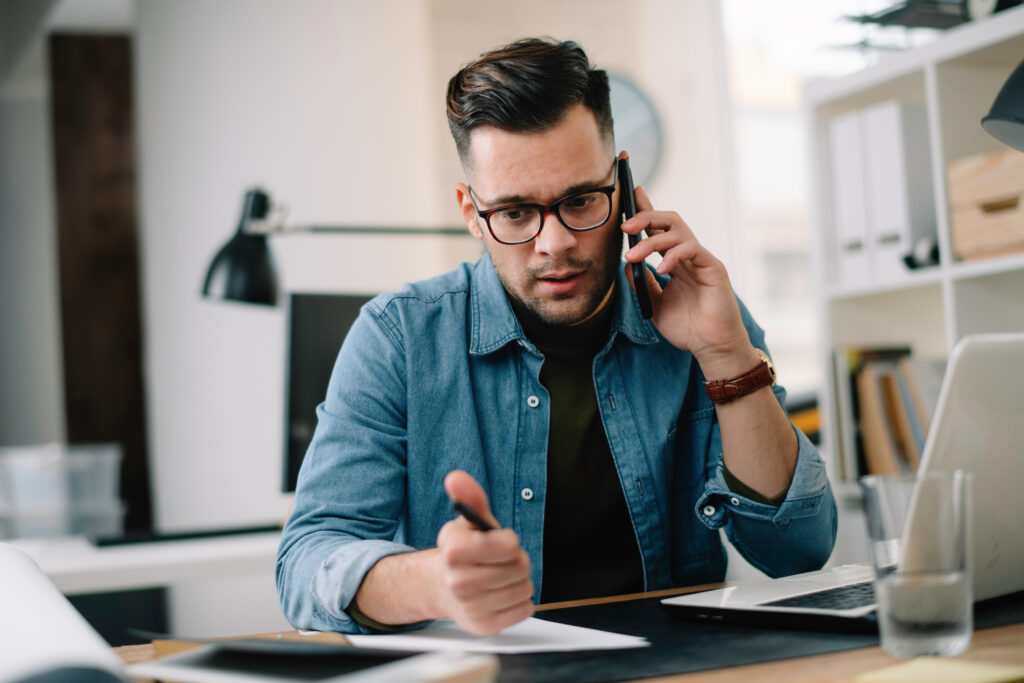 man-talking-seriously-on-phone